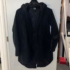 Woman’s black Champion winter coat
